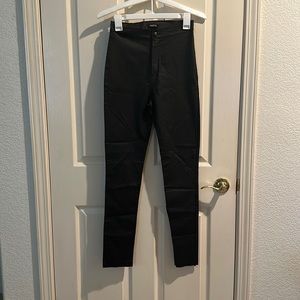 Black textured skinny jeans